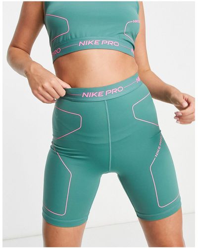 Nike Nike - pro training seasonal - pantaloncini a vita alta verdi e rosa - Multicolore