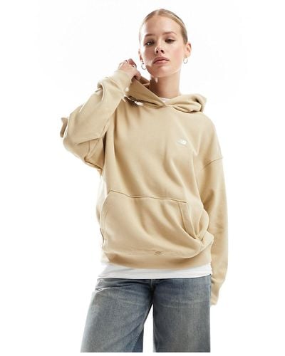 New Balance – sport essentials – hochwertiger kapuzenpullover aus fleece - Weiß