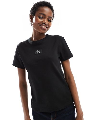 Calvin Klein T-shirt nera a coste con etichetta cucita del logo - Nero