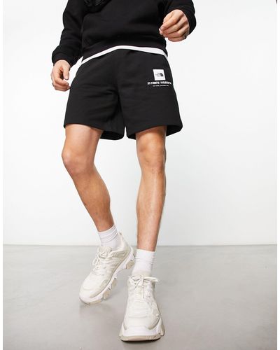 The North Face Coordinates - Fleece Short Met Logo - Zwart