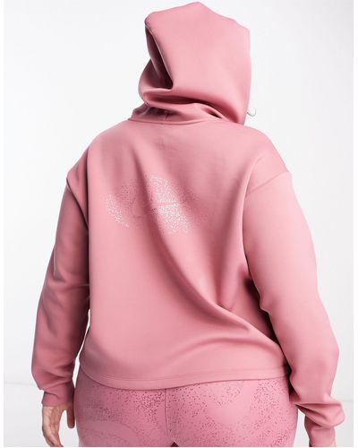 Nike Plus - sweat à capuche avec motif graphique pailleté - Rose