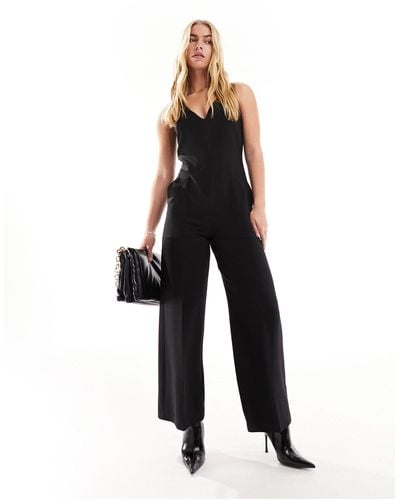 Closet Tuta jumpsuit sartoriale stile scamiciato nera con tasche - Nero