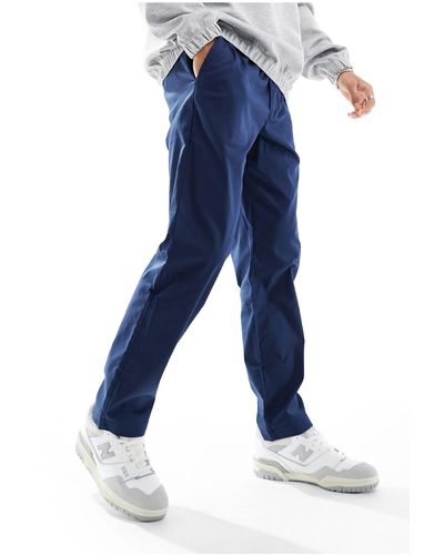 New Balance Pantaloni dritti - Blu