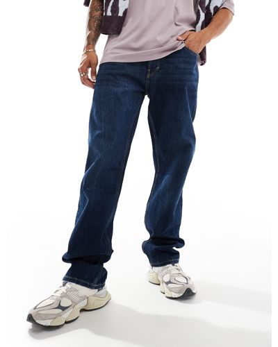 Weekday – space – jeans mit lockerem, geradem schnitt im 90er-stil - Blau