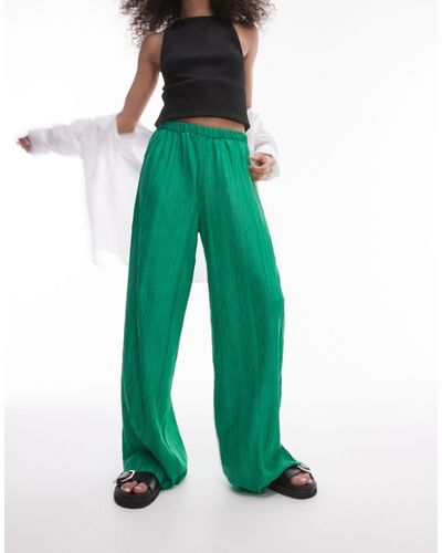 TOPSHOP Pantaloni stropicciati plissé verdi a fondo ampio - Verde
