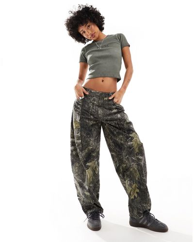 Reclaimed (vintage) Pantalon large à imprimé camouflage - Gris