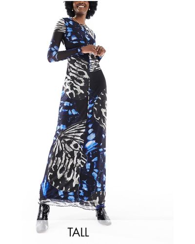 Vero Moda Robe longue en tulle imprimé papillons abstrait avec bords ondulés et manches longues - Bleu