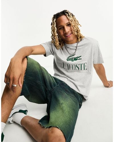 Lacoste – meliertes t-shirt mit großem krokodil-logo vorn - Grün