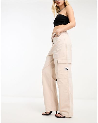 Calvin Klein Pantalon taille haute en velours côtelé - beige - Neutre