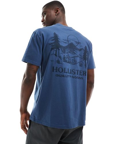 Hollister Camiseta azul holgada con bordado y estampado en la espalda