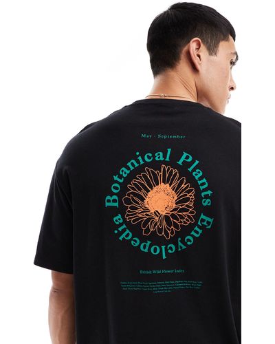 SELECTED T-shirt oversize nera con stampa botanica circolare sulla schiena - Blu
