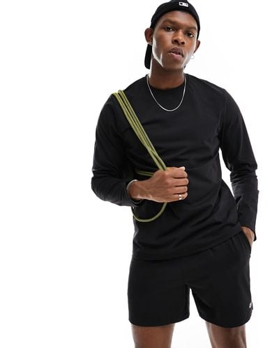 ASOS 4505 – langärmliges, schmal geschnittenes sport-shirt aus schnelltrocknendem material - Schwarz