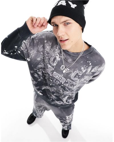 Collusion Varsity Sweatshirt With Hand Paint Splatter - Black