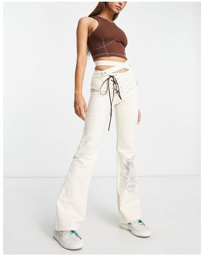 ZEMETA Pantaloni a vita bassa color écru con dettaglio incrociato a corsetto - Bianco