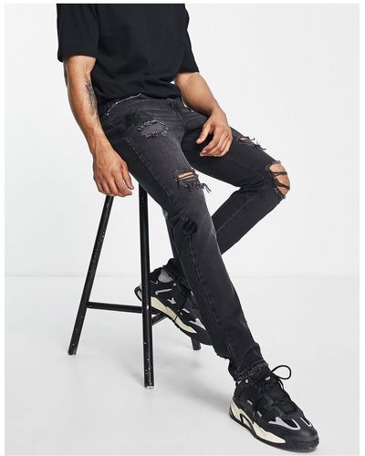The Couture Club Ruimvallende Distressed Jeans - Zwart