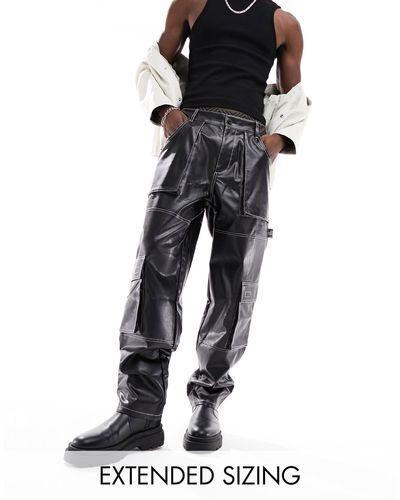 ASOS Pantalon cargo coupe baggy en imitation cuir avec coutures contrastantes - Noir