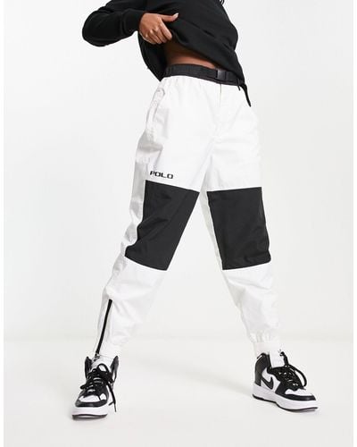 Polo Ralph Lauren Pantaloni sportivi multitasche con fondo elasticizzato bianchi e neri - Bianco