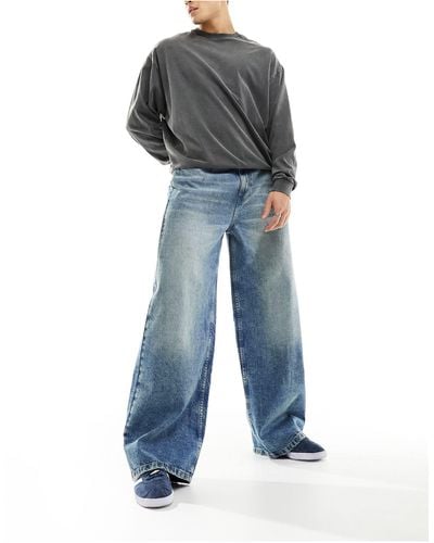 Collusion X013 - jeans con fondo ampio a vita medio alta lavaggio medio - Blu