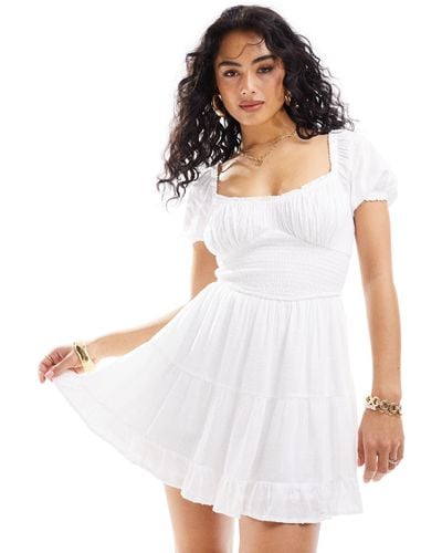 Hollister Smocked Waist Mini Dress With Pockets And Hidden Shorts - White
