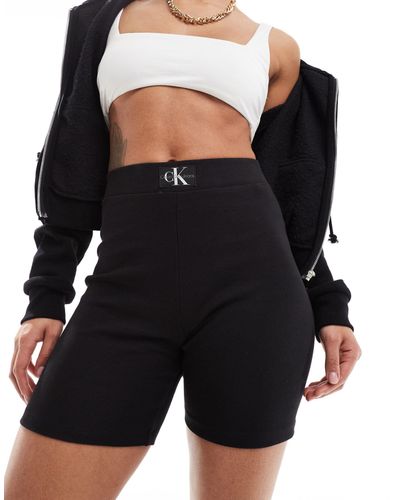 Calvin Klein – gerippte leggings-shorts - Schwarz