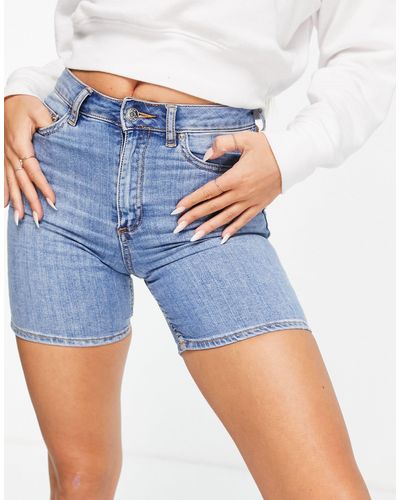 ASOS Short skinny taille haute en jean stretch - délavage moyen - Bleu