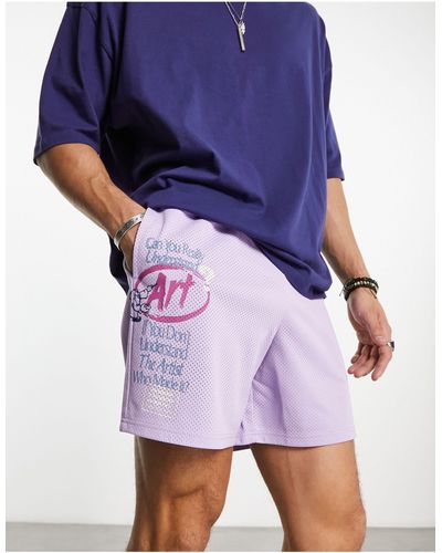 Coney Island Picnic Pantalones cortos s con estampados posicionales "art school" - Azul