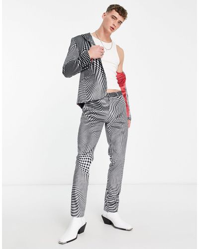 Twisted Tailor Amoros - pantaloni da abito skinny neri e bianchi con stampa distorta a quadri - Blu