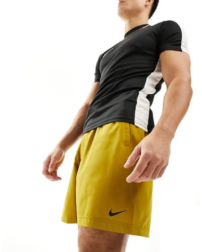 Nike Dri-fit form - pantaloncini marroni da 7" - Giallo