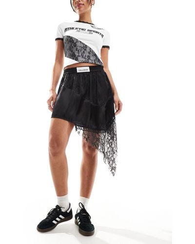 Collusion Asymmetric Mini Skirt With Satin And Lace Jacquard Mix - Black