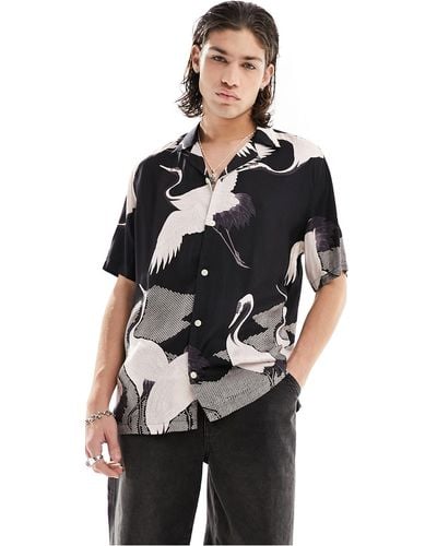 AllSaints Zikano - chemise à manches courtes et imprimé graphique - et blanc - Noir
