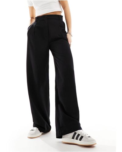 Monki Pantalon large ajusté à taille haute - Noir