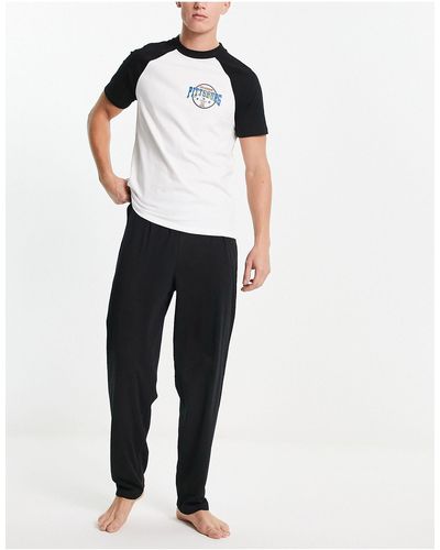 ASOS Pijama con camiseta con mangas raglán y estampado - Negro