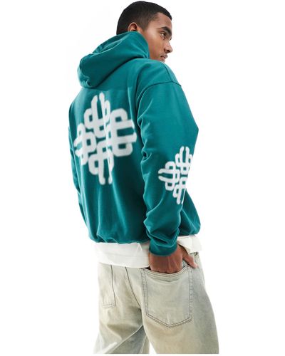 The Couture Club Blurred Emblem Graphic Hoodie - Blue