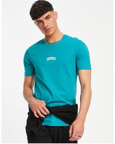 Good For Nothing Camiseta verde con logo estampado en el centro - Azul