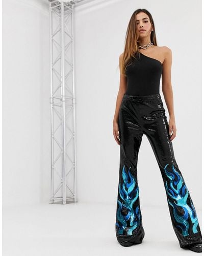 PrettyLittleThing Festival Flare Trousers With Flame Details - Black