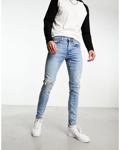Levi's Skinny Distressed Jeans Met Toelopende Pasvorm - Blauw