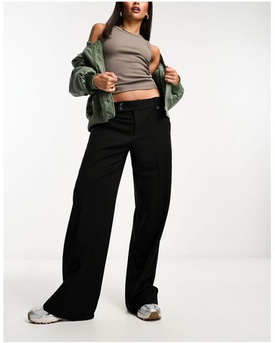 NA-KD X moa mattson - pantalon ajusté avec taille style années 90 - Noir