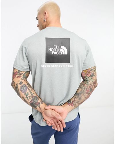 The North Face Training - Reaxion Redbox - T-shirt Met Print Op - Grijs