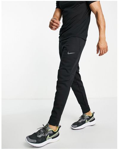 Nike Nike - pro training - sphere - jogger en tissu therma-fit - Noir