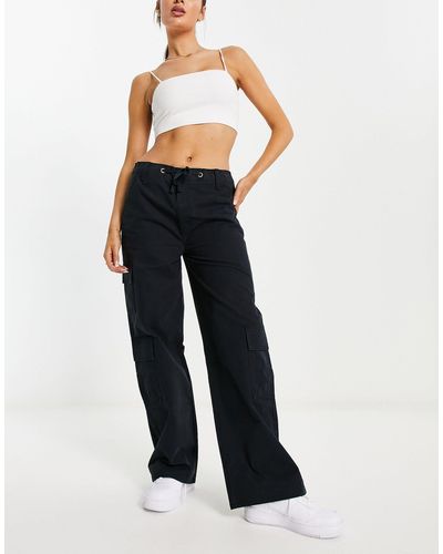 ASOS Oversized Cargo Trouser With Multi Pocket And Tie Waist - Blue