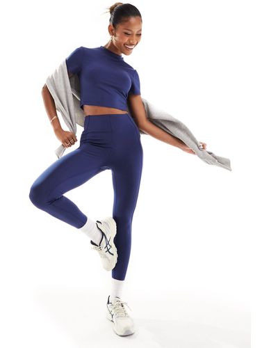 ASOS 4505 Asos – 4505 – einfarbige leggings mit tasche und figurformendem gesäßteil - Blau