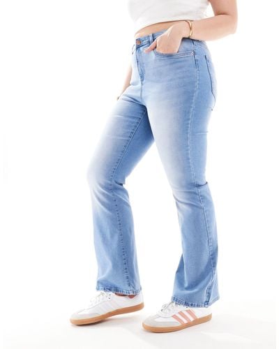 ONLY Sally - jeans a zampa a vita alta azzurro candeggiato - Blu