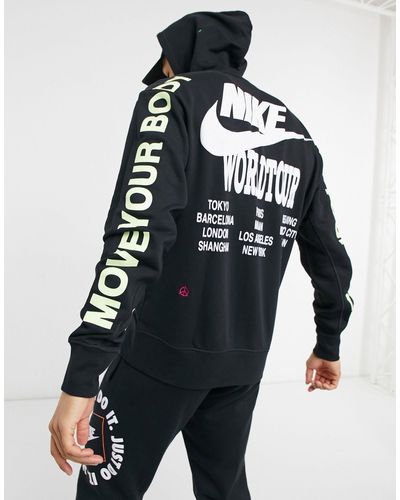 Nike Sudadera con capucha negra con estampado gráfico world tour pack - Negro