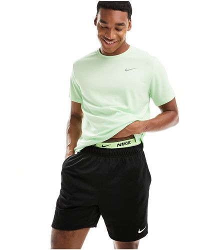 Nike – dri-fit miler – t-shirt - Grün