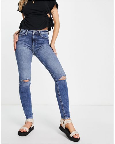 ONLY Jeans skinny a vita alta con dettagli effetto invecchiato sulle ginocchia lavaggio medio - Blu