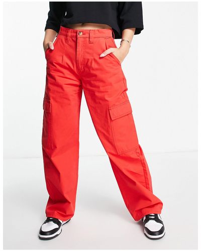 Red cargo outlet trousers womens