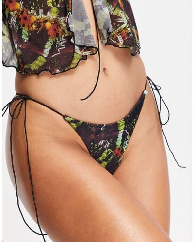 Jaded London – seitlich gebundene bikinihose mit hohem beinausschnitt und schmetterlingsmuster - Mehrfarbig