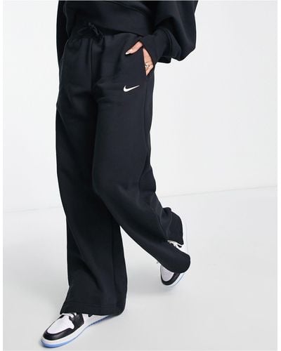 Nike Joggers a vita alta a fondo ampio neri e color vela con logo piccolo - Blu