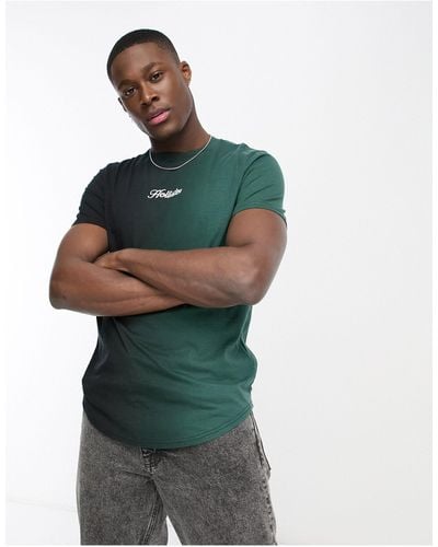 Hollister X asos – exklusives t-shirt mit schwarz/grünem farbverlauf, zentriertem logo und abgerundetem saum