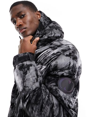 Criminal Damage Puffer Jacket With All Over Graphic Print - Black